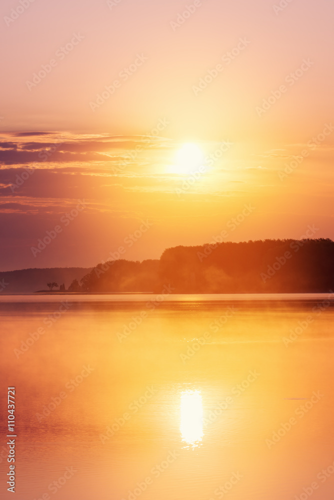Landscape with sunrise on lake
