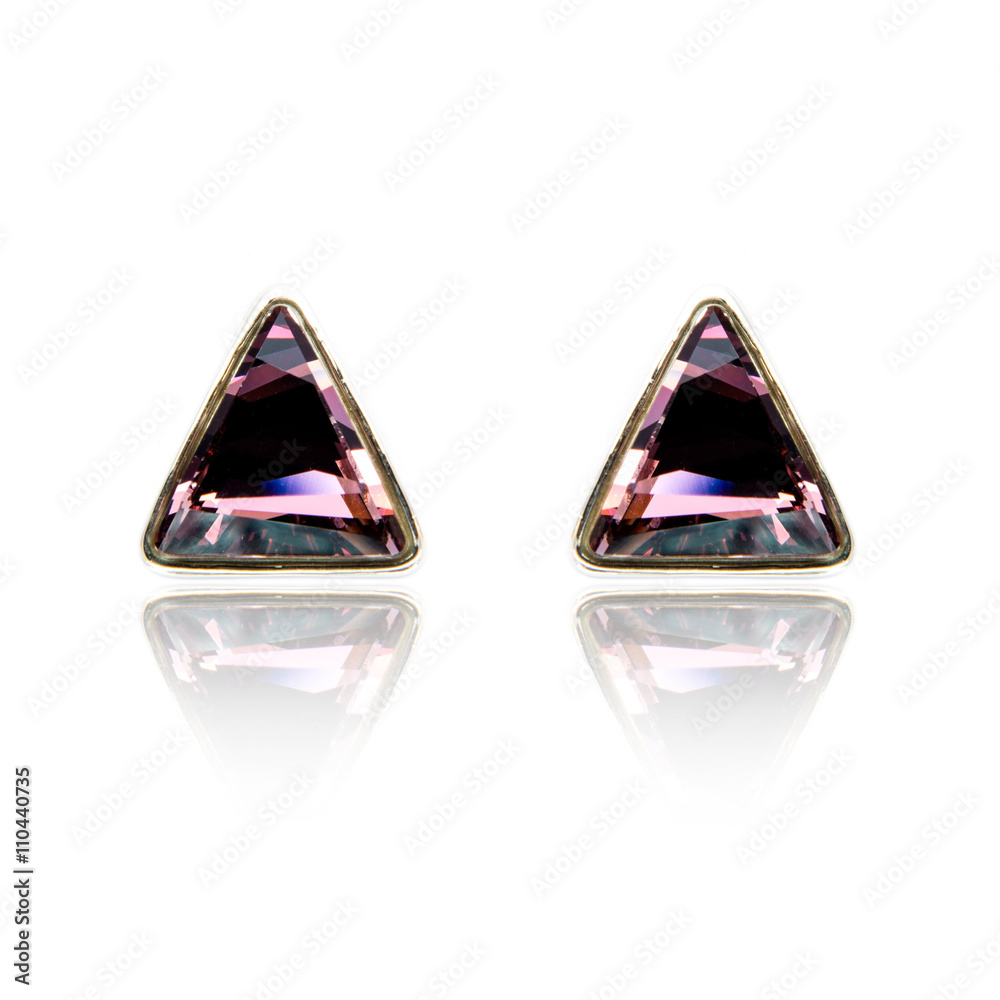 Pair of diamond earrings isolated on white Pair of diamond earrings isolated on white