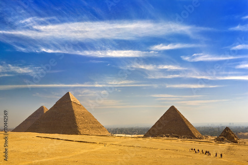 Egypt. Cairo - Giza. General view of pyramids from the Giza Plateau  from left  the Pyramid of Cheops  Chephren  Mykerinos and one of the small pyramids popularly known as Queens  Pyramids 