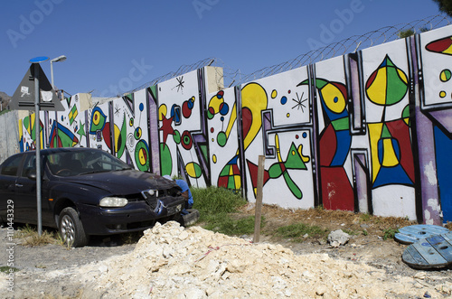 IMIZAMO YETHU TOWNSHIP WESTERN CAPE SOUTH AFRICA . A general view of the Imizamo Yethu township at Hout Bay and the newly painted walls of the exterior fence photo