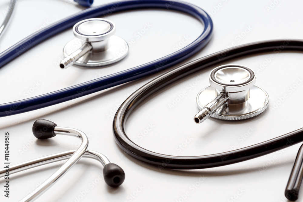 two disassembled stethoscope in white background two disassembled stethoscope in white background