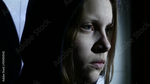 Closeup portrait of an angry teen girl. 4K UHD
