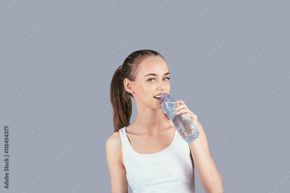 Beautiful girl with a bottle of water Beautiful girl with a bottle of water