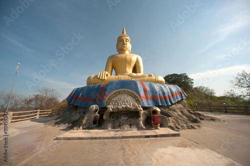 Outdoor large sitting Buddha on top of Kho Tao temple near Khao Tao beach Thailand.