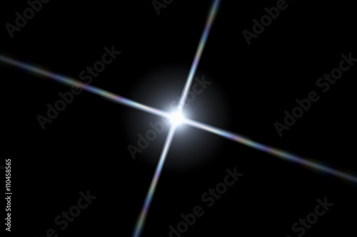Abstract lens flare light over dark background