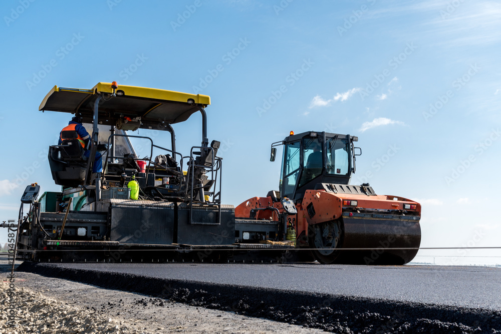 Road rollers working on the construction site Road rollers working on the construction site