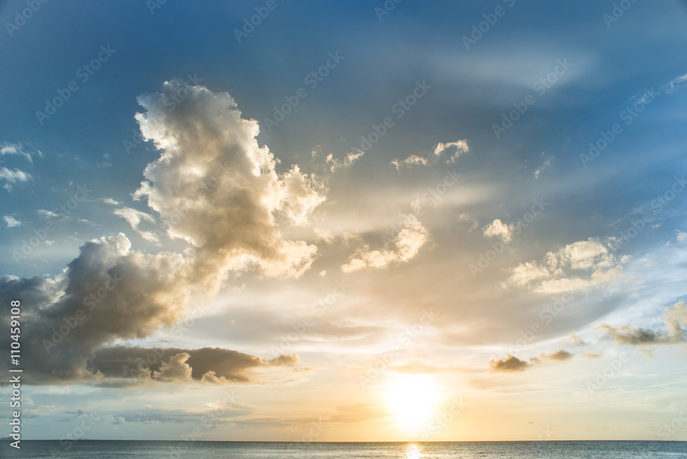 sunset on the sea with cloudy sky background
