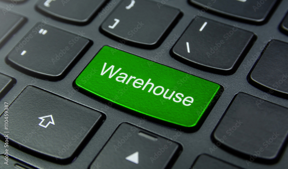 Business Concept: Close-up the Warehouse button on the keyboard and have Lime, Green color button isolate black keyboard Business Concept: Close-up the Warehouse button on the keyboard and have Lime, Green color button isolate black keyboard
