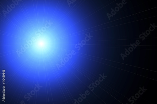 Abstract lens flare light over dark background