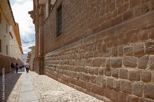 People walking the street of Cuzco Peru
