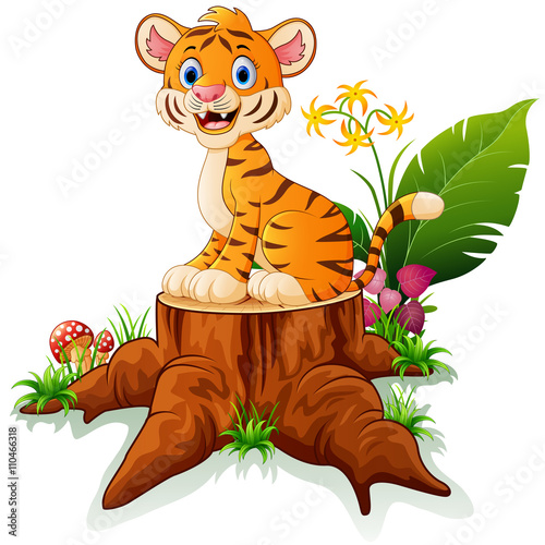 Cartoon tiger sitting on tree stump photo