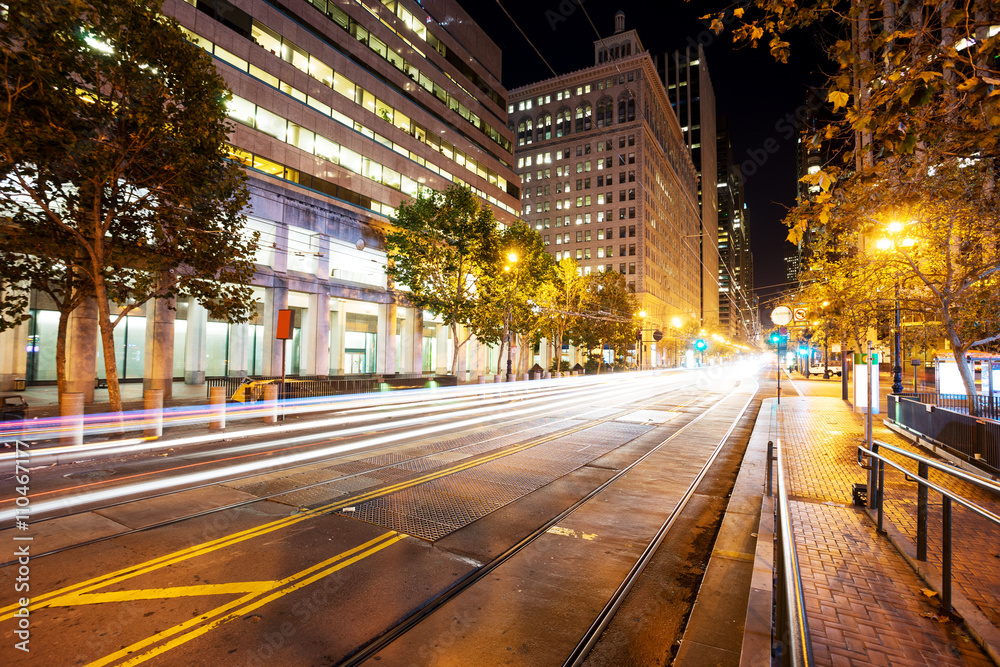 road with tramway in san francisco at night