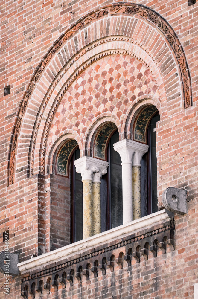 Triple lancet window of medieval palace.