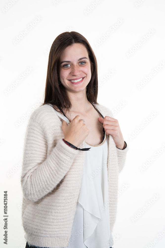Smiling Fashion model posing at studio with long hair Smiling Fashion model posing at studio with long hair