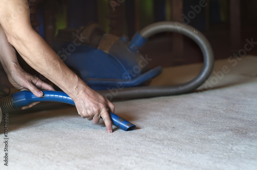 Hands With Vacuum Cleaner