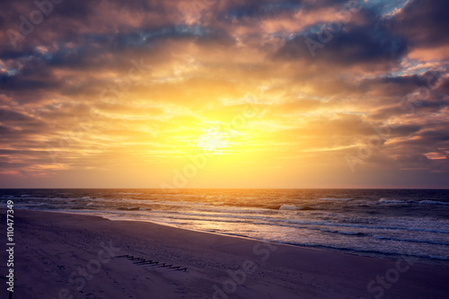 Evening on the beach  sunset over sea