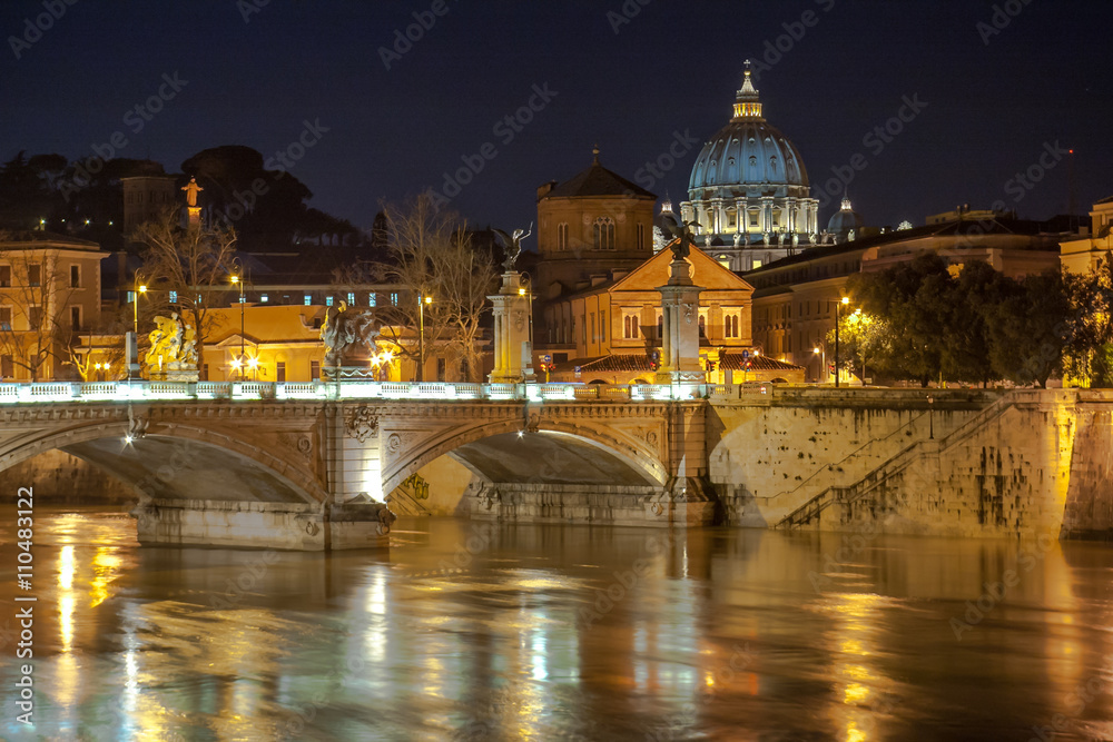 Angelo Bridge and St. Peter's Basilica in the twilight, Rome, Italy