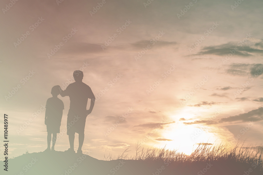 Father and son looking for future,  silhouette concept