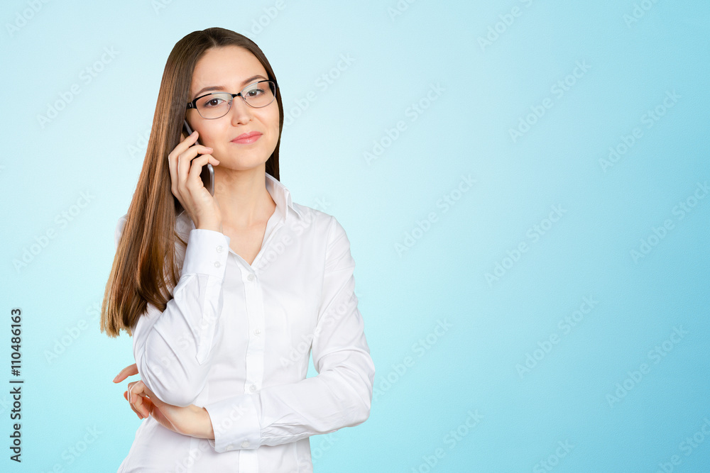 Young, confident, successful and beautiful business woman with the mobile phone isolated Young, confident, successful and beautiful business woman with the mobile phone isolated
