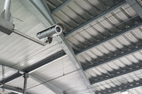 CCTV security camera inside office building © anuwattn