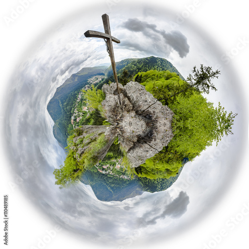Fototapeta Naklejka Na Ścianę i Meble -  Large Christian wooden cross on a mountain peak of 360 degree miniplanet. Panoramic montage from 16 HDR images