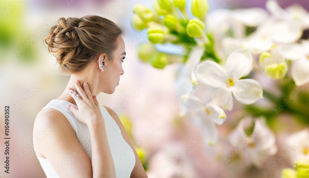 close up of beautiful woman with ring and earring close up of beautiful woman with ring and earring