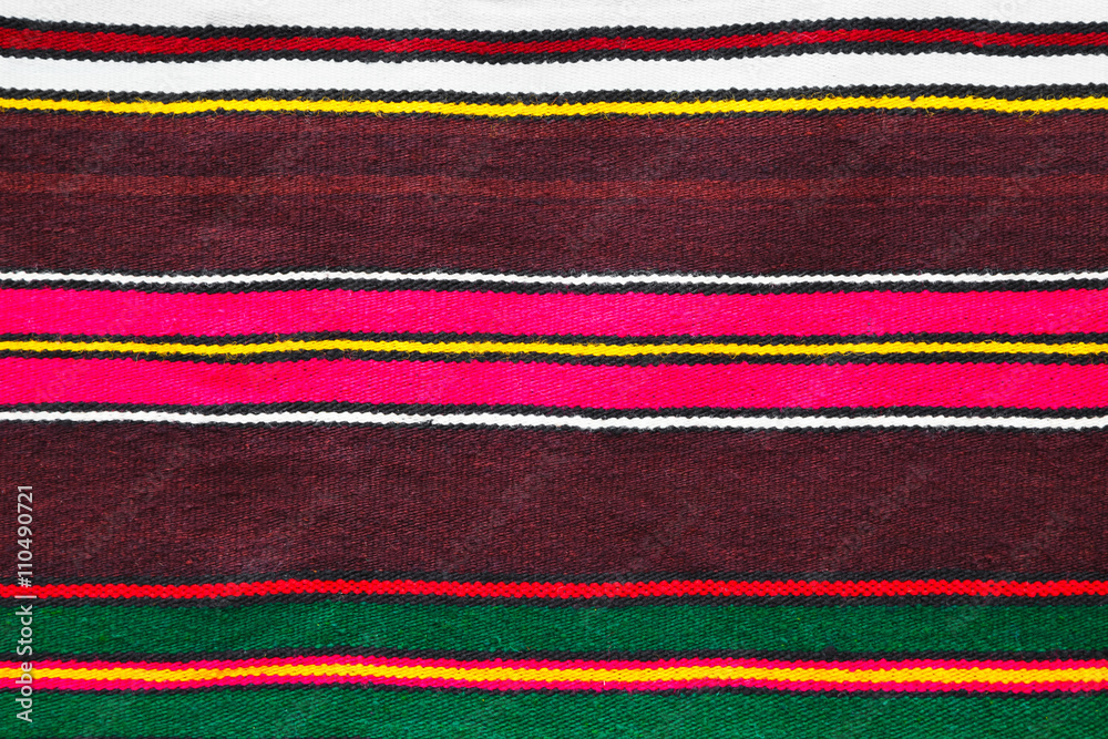 Handmade woollen rug with colorful stripes Handmade woollen rug with colorful stripes