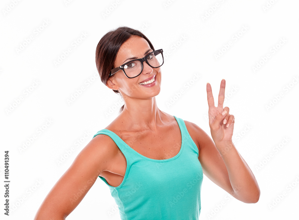 Celebrating adult woman smiling at camera Celebrating adult woman smiling at camera