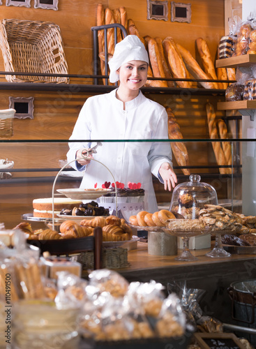 Female staff in local bakery.