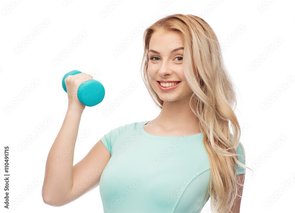 smiling beautiful young sporty woman with dumbbell smiling beautiful young sporty woman with dumbbell