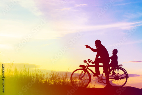 Biker family silhouette father and son