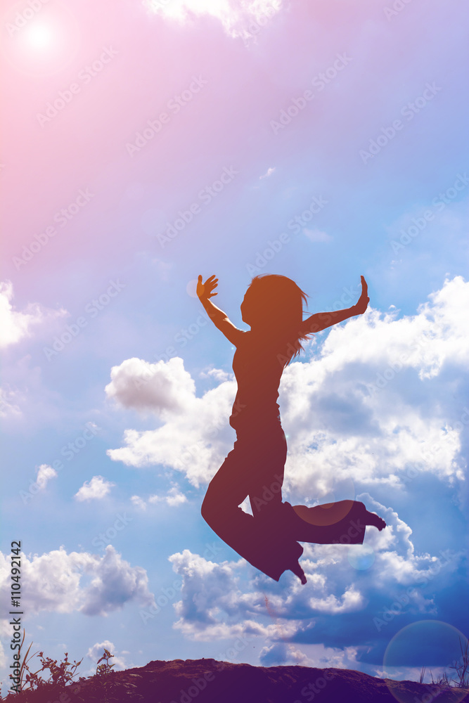 Silhouette of a beautiful girl jumping Silhouette of a beautiful girl jumping