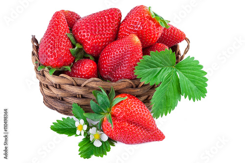Basket of strawberries closeup. Isolated on white background.