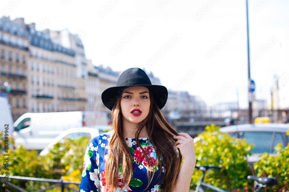 Portrait of the beautiful fashionable girl outdoor on sunny spring day.