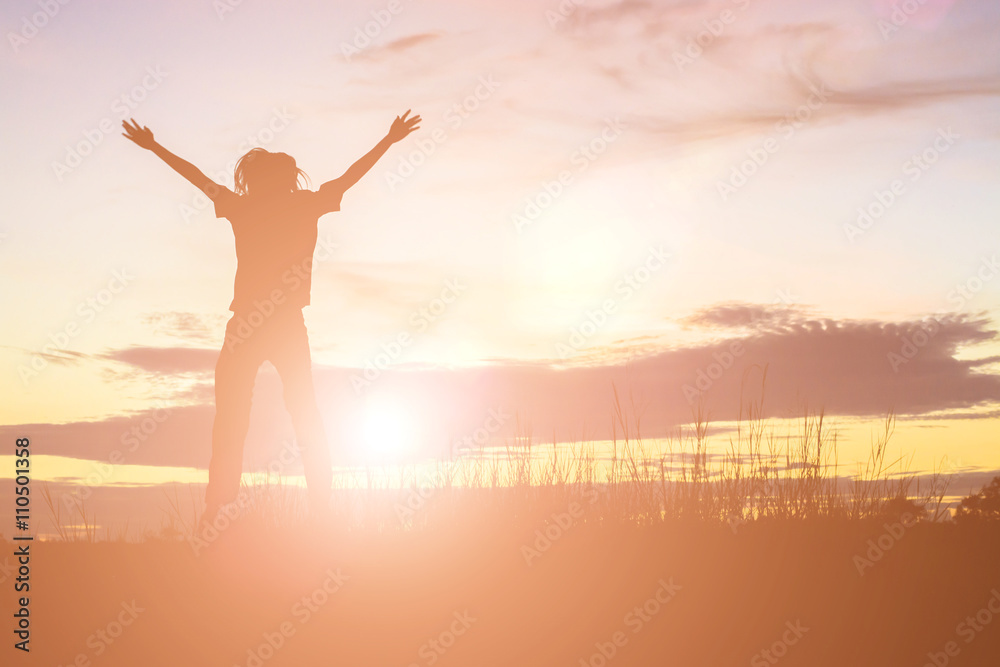 Fototapeta premium Silhouette of a beautiful girl jumping
