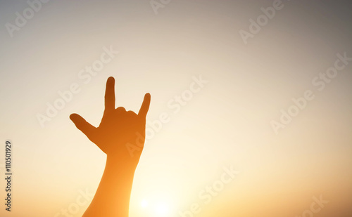 Silhouette showing I LOVE YOU sign hand shape