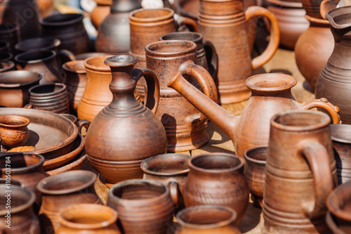 Lots of handmade clay pot, bowl and mug.