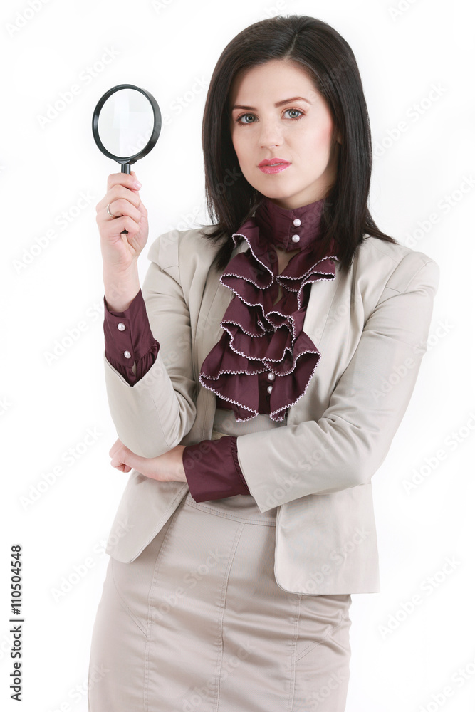 Young attractive business woman with a magnifying glass Young attractive business woman with a magnifying glass