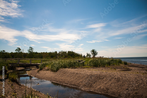 Thanks to the small foot bridge, this picnic area is accessible even at high tide. photo