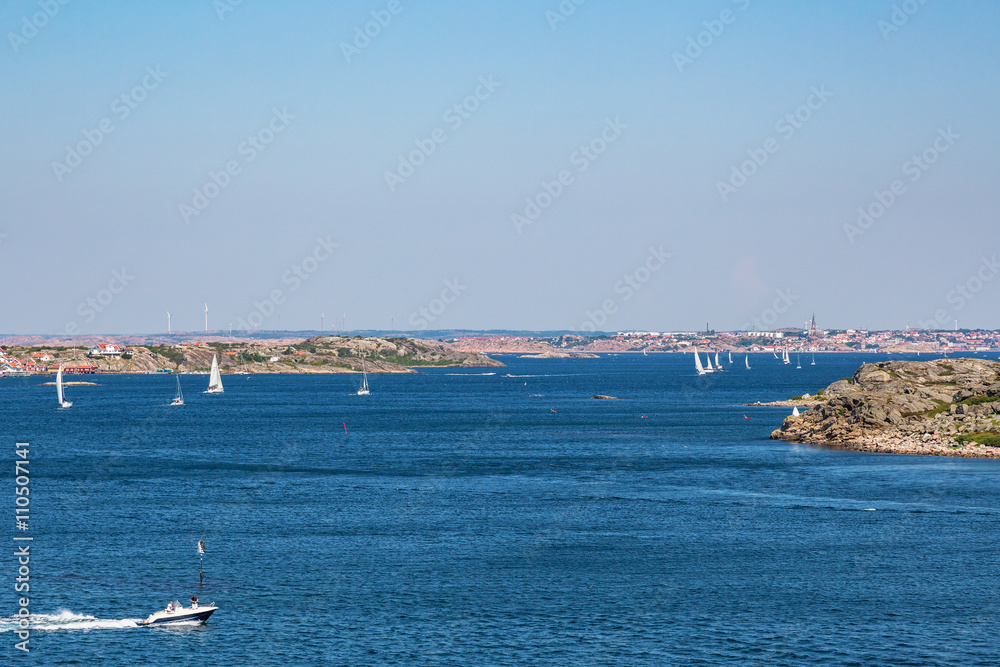 View of the sea archipelago on the Swedish west coast with the town of Lysekil on the horizon.