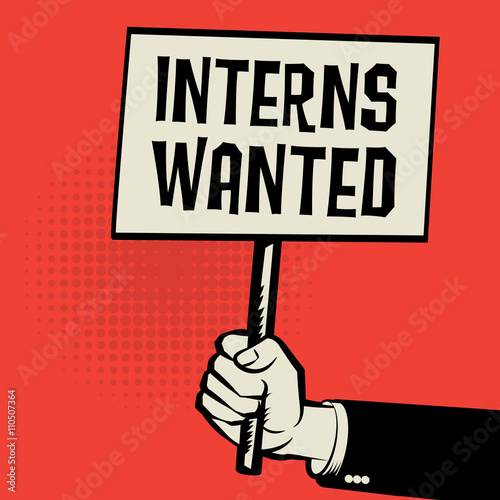 Poster in hand, business concept with text Interns Wanted