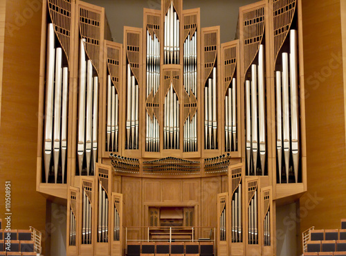 Organ pipes in a large concert hall . Musical instrument. Grand Concert Hall. Classical music

