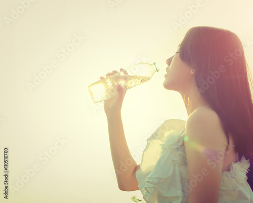 Woman drink water for thirst,dream soft style.