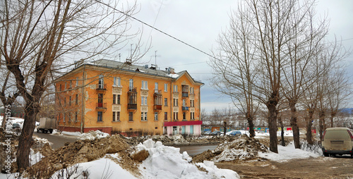 Old Stalin-era building on Gorky Street in the city Novouralsk (closed town in Sverdlovsk Oblast) in Russia.