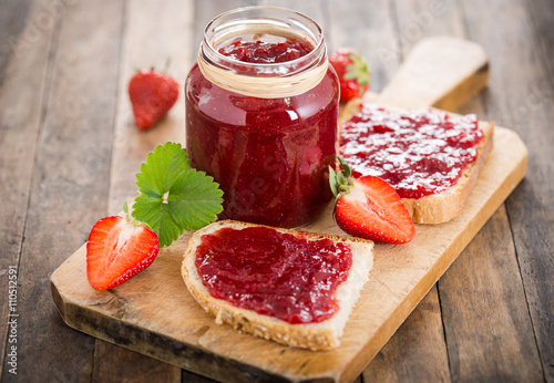 Strawberry jam on the bread photo