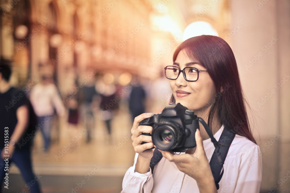 Girl taking pictures in Milan