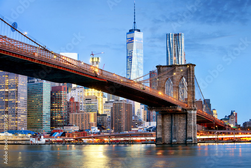Brooklyn bridge and WTC Freedom tower at night  New York