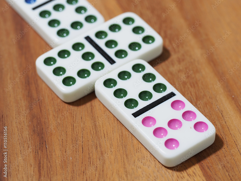 dominoes on wooden background dominoes on wooden background