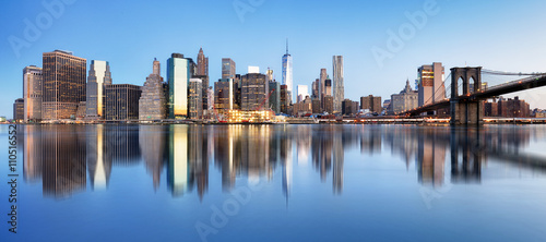 New York downtown panorama with brooklyn bridge and skyscrapers photo