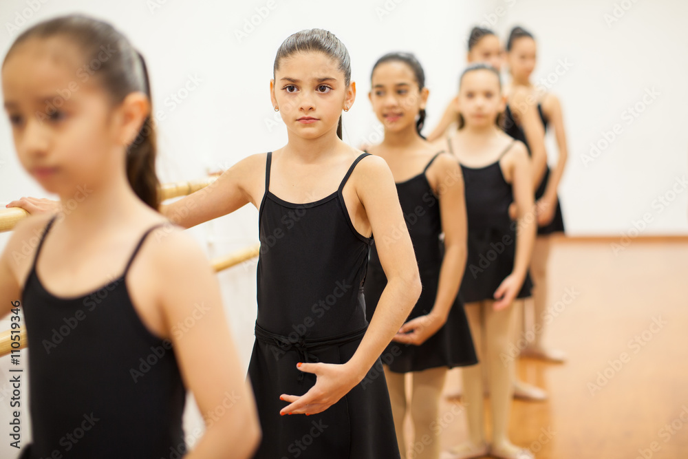 Group of girls paying attention to dance class